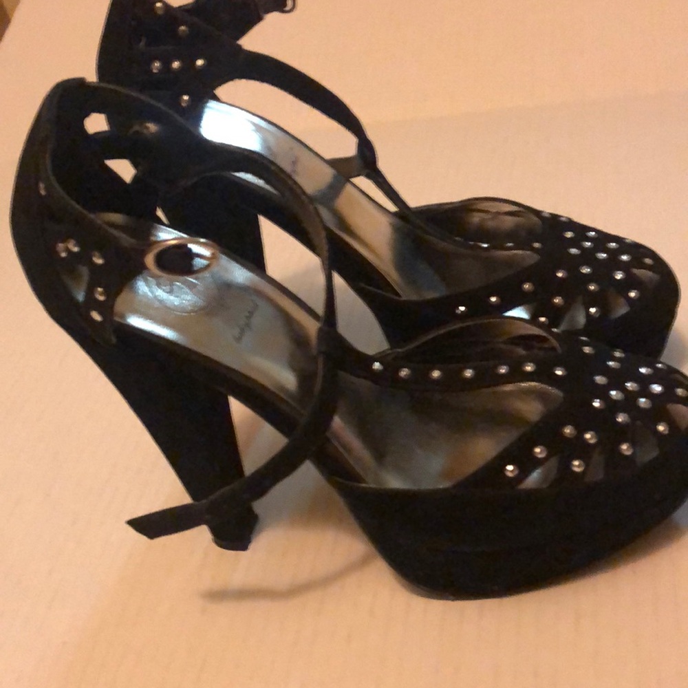 Baby phat 7 1/2 High Heel Platform 
1.77" Platform Height
5.51" Heel Height